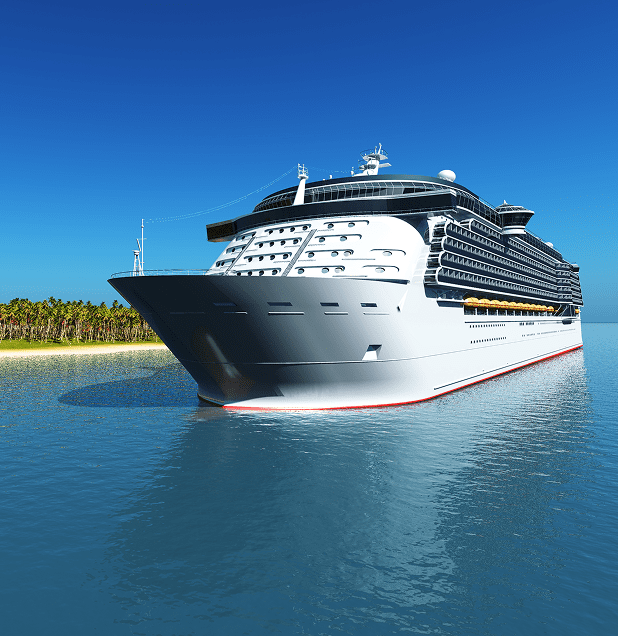 Cruise ship near tropical island, clear sky.